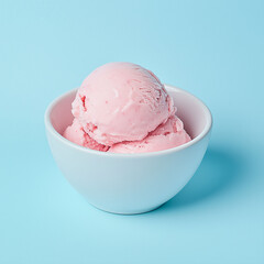 An artisan scoop of bright pink strawberry ice cream in a bowl