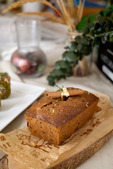 Cinnamon bread loaf set on cafe table.