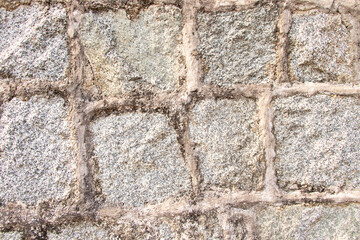 Grey grunge stone fence or brick block wall. Cement wall pattern. Concrete walls of house can be used model for building, house wall for background for website wallpaper. Background Texture abstract.