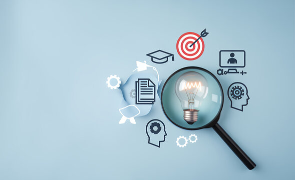 Unlocking Potential: Educational Growth & Goal Achievement. A magnifying glass reveals a bright lightbulb idea amidst learning icons; online learning, e-learning,        