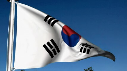 South Korean flag waving against a clear blue sky. Independence Movement Day. National pride, heritage, and identity