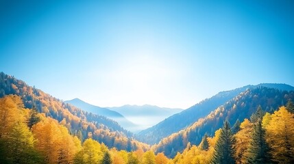 Vibrant autumn landscape showcasing golden trees under a clear blue sky with distant mountains