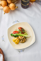 Vibrant Grilled Vegetables on Elegant Plate with Soft Lighting and Subtle Contrast