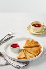 Pancakes with Berry Jam Minimalist Food Presentation with Bright Contrast and Warm Tones