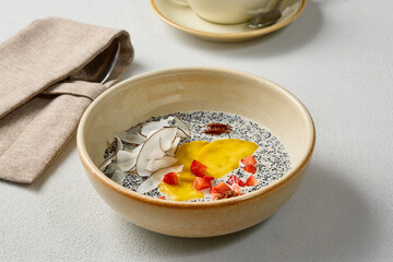 Quinoa Coconut Milk Porridge with Mango and Coconut - Bright, Minimalist Food Photography