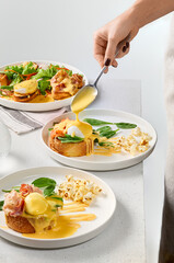 Elegant Breakfast Composition with Poached Eggs on Brioche A Culinary Delight in Natural Light