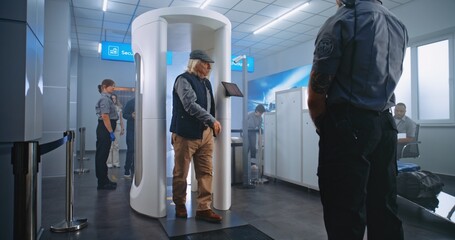 Airport Terminal Checkpoint: Diverse People Walking Through Metal Detector Gates, Taking Luggage...