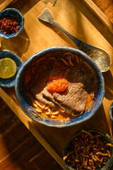 Close up Spicy curry noodles soup with coconut milk and beef