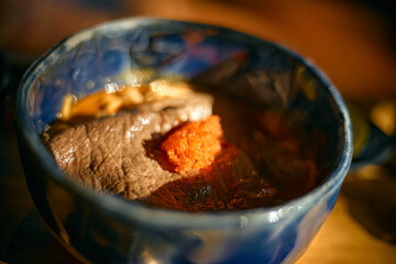 Close up Spicy curry noodles soup with coconut milk and beef