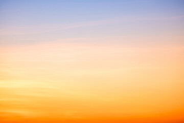Sky,sunset, beautiful , luxury soft gradient orange gold clouds and sunlight on the blue sky perfect for the background, Sunrise on morning or everning in winter warm time ,Twilight summer,silhouette