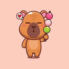 capybara mascot cartoon character vector illustration eating dango.