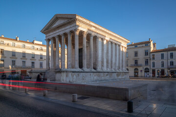 Maison Carree - restored roman temple dedicated to 'princes of youth', with richly decorated columns & friezes in Nimes, France