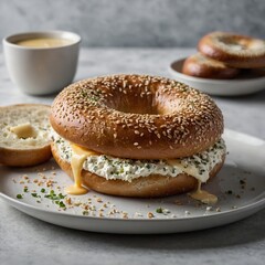 A sesame bagel sandwich filled with cream cheese, cucumbers, and melted cheese, served with coffee. Freshly Toasted Bagel with Cream Cheese