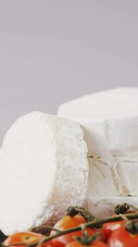 Cheese with tomatoes and rosemary herb