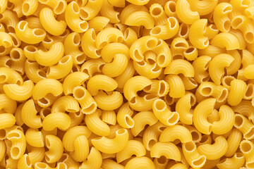 Top view of raw macaroni background