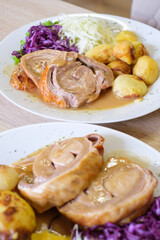 Roasted meat rolls with potatoes and cabbage