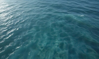 Obraz premium A vast expanse of blue river waters with gentle ocean waves on the surface, movement, soothing, flowing