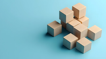 Wooden cubes arranged on blue background symbolize strategic planning and organization. minimalist design highlights simplicity and elegance of concept