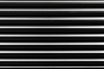 Obraz premium Textured black brick wall with horizontal alignment, blending industrial charm with a sleek and bold appearance