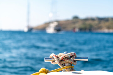 sailors knot in front of the yacht boat. luxury and private concept. boat on the sea, summer cruise...
