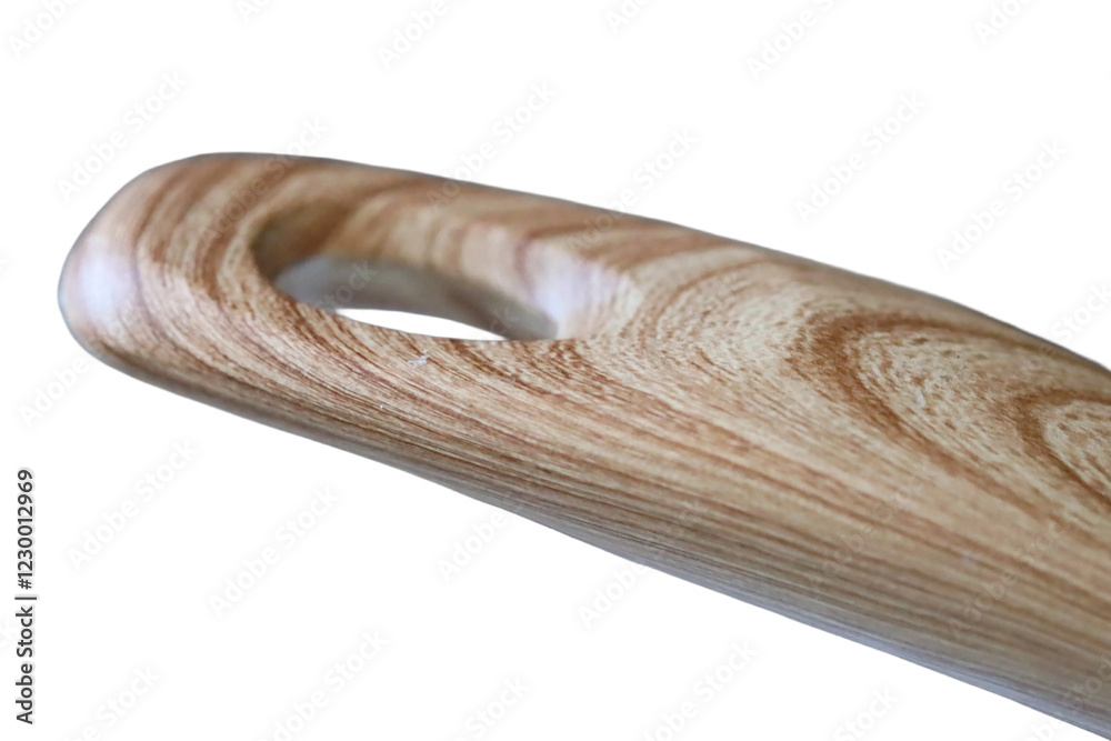 Poster close-up of a wooden object on a white surface, ideal for showcasing textures and details.