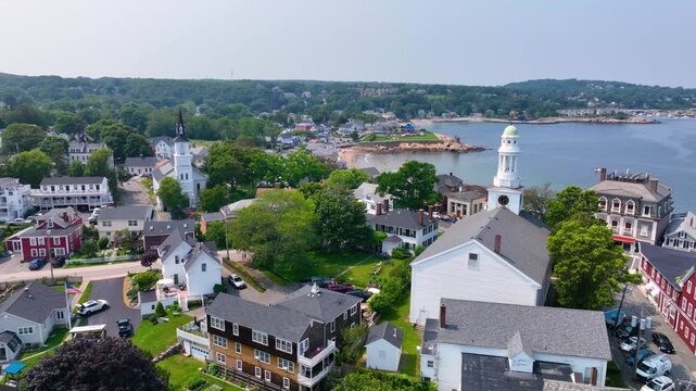 Flying over First Congregational Church and Front Beach in historic town center of Rockport, Massachusetts MA, USA. 