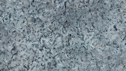 Close-up textured blue stone surface, detailed background, design element for website or print