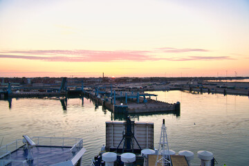 The harbor of Trelleborg, at sunrise with a view of the city in the background.