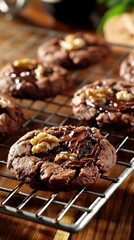 Freshly baked chocolate walnut cookies on cooling rack
