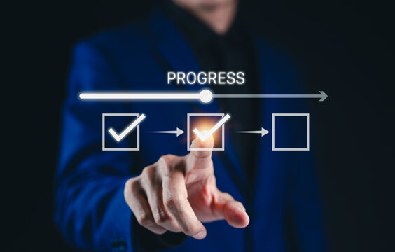 Progress Tracking and Task Management Concept. A person interacting with progress bar and checklist symbolizes task management, project development, and workflow efficiency in business operations.