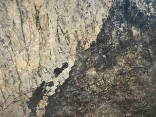 Natural brown grey marble with random abstract texture. Luxurious rare type light brown, white, beige, and grey natural marble stone, Seamless background texture.
