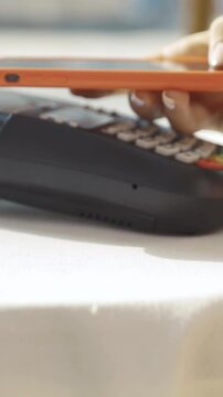 A sleek Mobile Payment Terminal placed elegantly on a Table within a Modern Setting