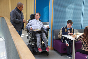 Smiling disabled people in office