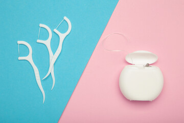 Set of different dental floss on colorful background. Oral dental care products, hygiene cleaning personal use lifestyle concept