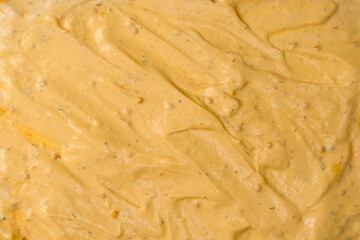 Yellow sauce splashes as a background.