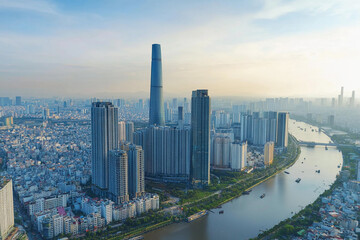 Urban skyline reflecting in calm water during late afternoon with clouds in the sky