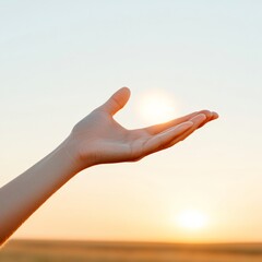 Golden Hour Serenity Hand Releasing Glowing Orb into Sunset Sky Inspirational Visual for Environmental Campaigns and Motivational Branding Designs