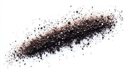 Dark Soil Spread Across White Surface with Texture and Detail