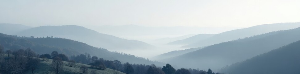 Obraz premium A delicate fog settles over a grey and white landscape of rolling hills, grey, hill, serene