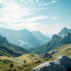 Naklejka premium Majestic Mountain Landscape with Lush Green Foothills and Blue Sky