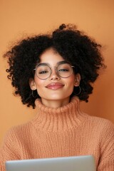 Contemporary Virtual Pitch Young Entrepreneur in Cozy Knit on Laptop - Digital Networking and Remote Innovation for Modern Business Mentoring in a Creative Incubator Setting