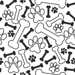 Black and White Dog Bones and Paws Pattern - Small and Large Bones and Footprints on White Background. Seamless Link.