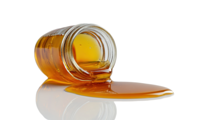 Isolated Honey Jar Tipped Over with Spilled Honey