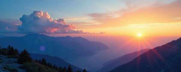 Obraz premium Sunset over the mountains on a blue sky with fluffy white clouds, light, glow