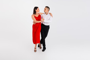 Full length photo of graceful lady man wear classic outfits dancing latino choreography blank space...