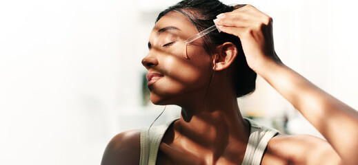 Home, woman and face with serum for skincare, wellness and moisture for self care by mockup space....