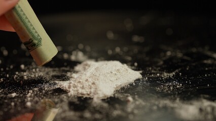Person planning to get high with illegal dangerous street opioid Fentanyl drugs, white powder...