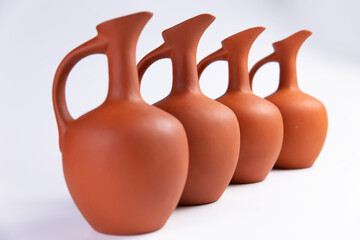 Clay jugs. On a light background. © Игорь Соколов