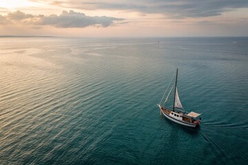 Fototapeta premium Aerial view of a boat at sea. Image created with AI