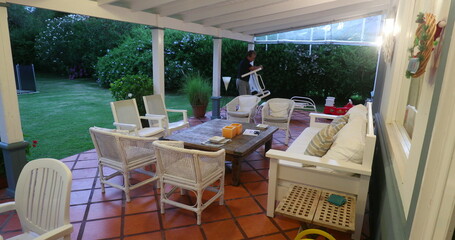 House backyard porch with sofas and chairs